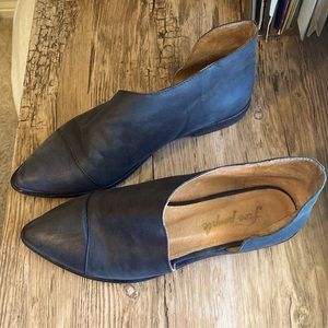 Black leather Free People pointed toe slide on shoes